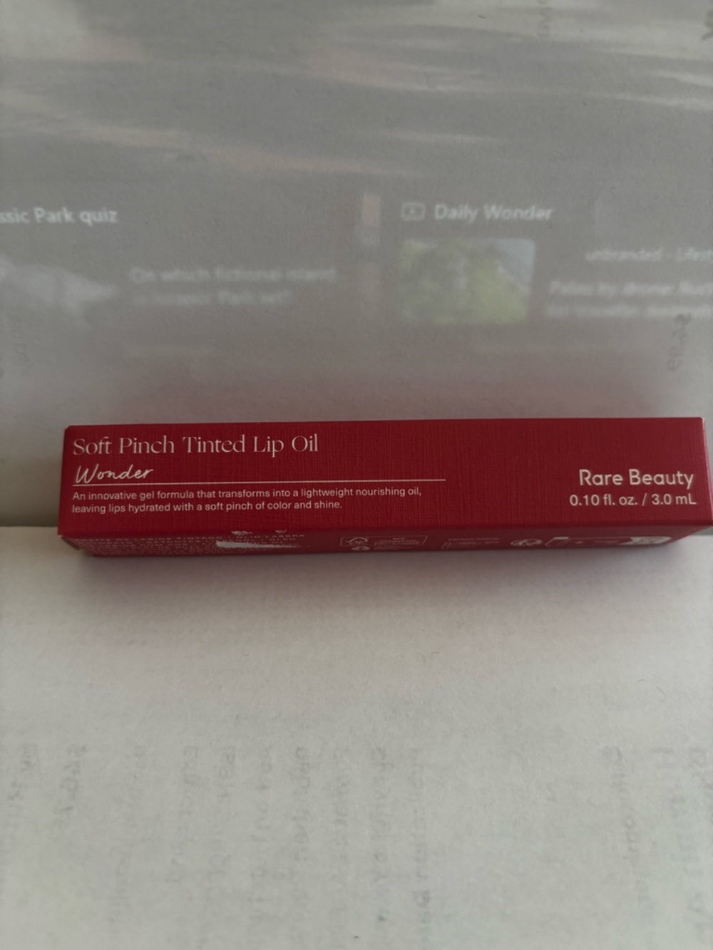 Rare Beauty Tinted Lip Oil in Deep Red with Gold Accent